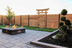 Interlocking patio, fire-feature, outdoor lighting, custom garden box, custom wood fence, custom torii gate